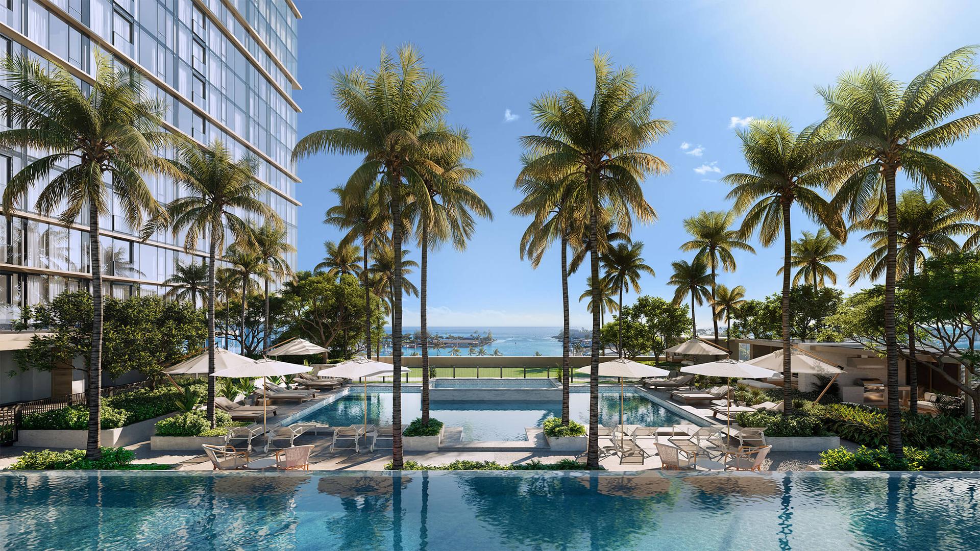 Resort-style infinity pool at Park Ward Village with panoramic ocean views