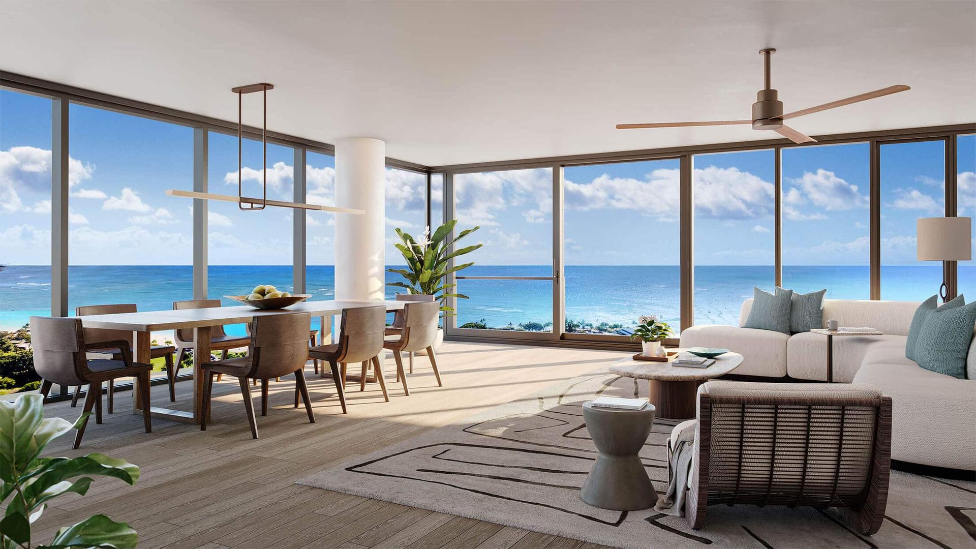 Spacious living room in Unit 4010 with floor-to-ceiling ocean view windows