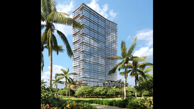Park Ward Village tower exterior at sunset with ocean backdrop in Honolulu
